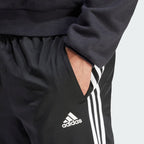 Men's adidas Essentials Warm-Up Tapered 3-Stripes Track Pants
